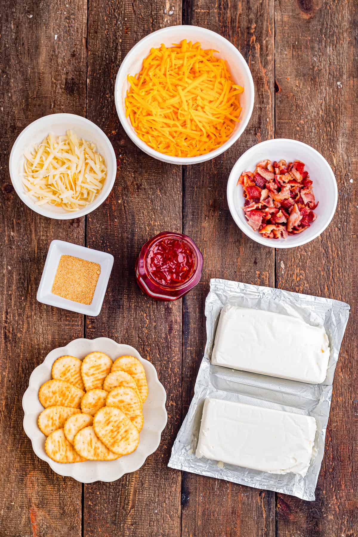 This easy Pepper Jelly Cream Cheese Dip is creamy, cheesy, smoky, and perfectly sweet and spicy! Perfect for holidays & game days. Overhead view of ingredients needed to make pepper jelly cream cheese dip
