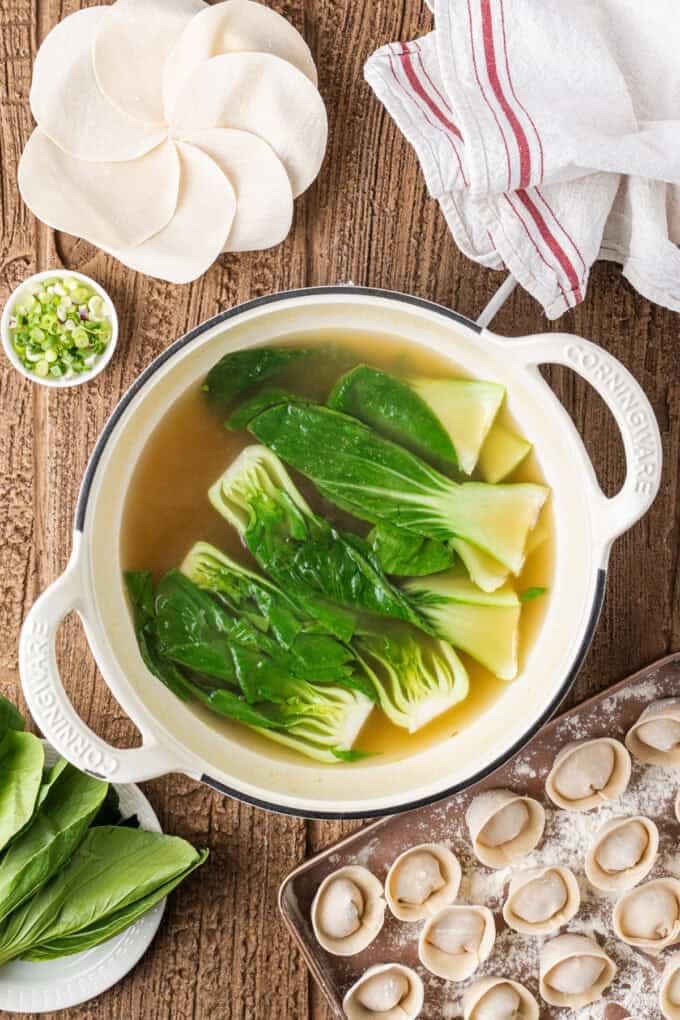 This easy Wonton Soup features tender homemade wontons filled with juicy pork and shrimp in a light, aromatic chicken broth. Bok choy cooking in broth